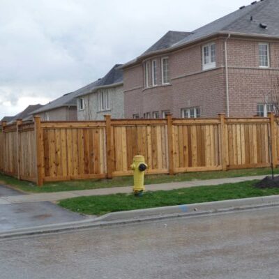 Wooden fence around suburban houses
